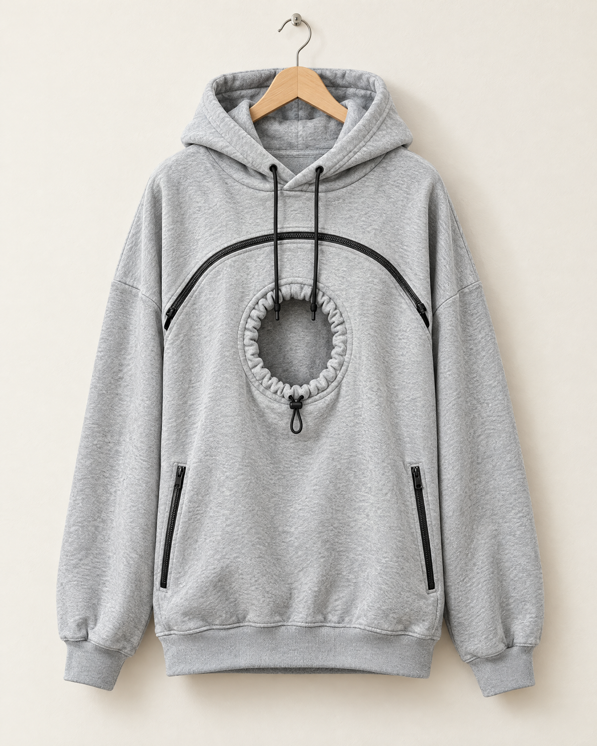 The Pawdie Pocket Hoodie in light gray on a hanger